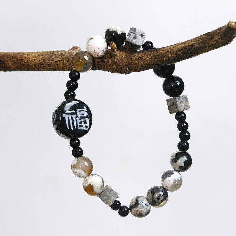 Bracelet en agate onyx noire de 8 mm avec symbole de fortune Fu