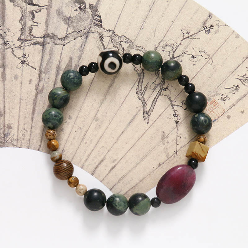 Bracelet Dzi à trois yeux en agate verte de 8 mm