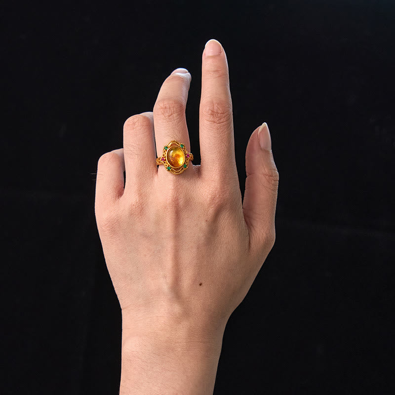 Bague ajustable en ambre fleurie pour la confiance et la force intérieure