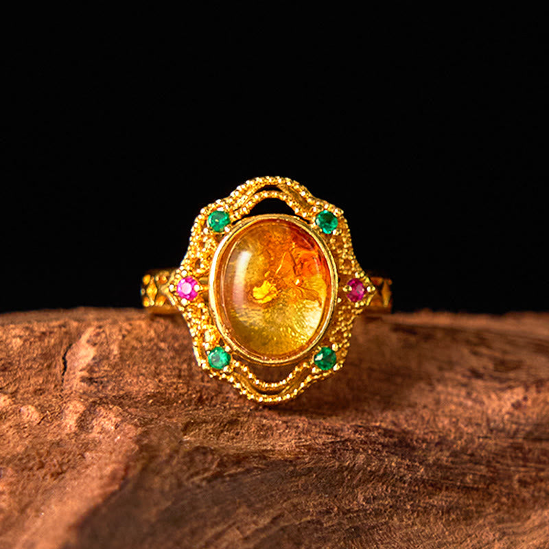 Bague ajustable en ambre fleurie pour la confiance et la force intérieure