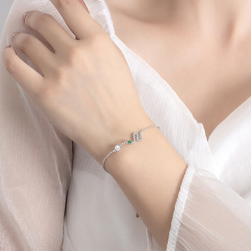 Bracelet porte-bonheur en argent sterling et perles serpent