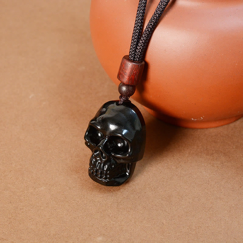 Collier squelette en obsidienne noire pour l'épanouissement et la transformation