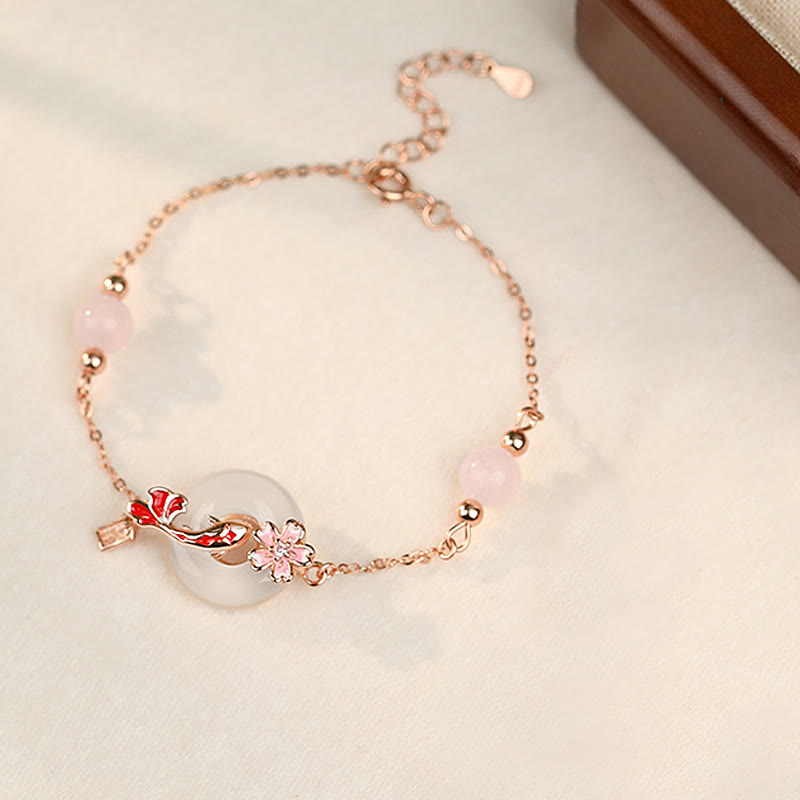 Bracelet de paix en argent sterling avec calcédoine rose et poisson koï