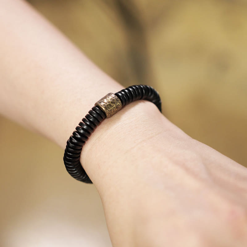 Bracelet apaisant en bois d'ébène et laiton | Bijoux de paix et d'ancrage
