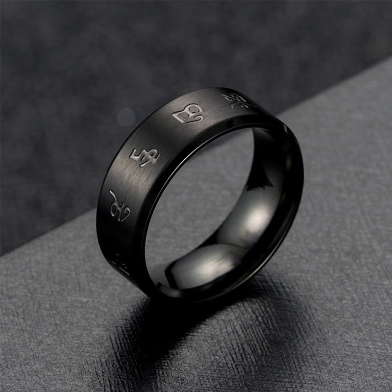 Bague en acier titane avec mantra Jambhala noir