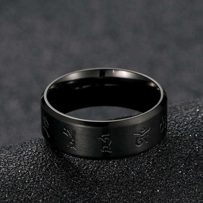 Bague en acier titane avec mantra Jambhala noir