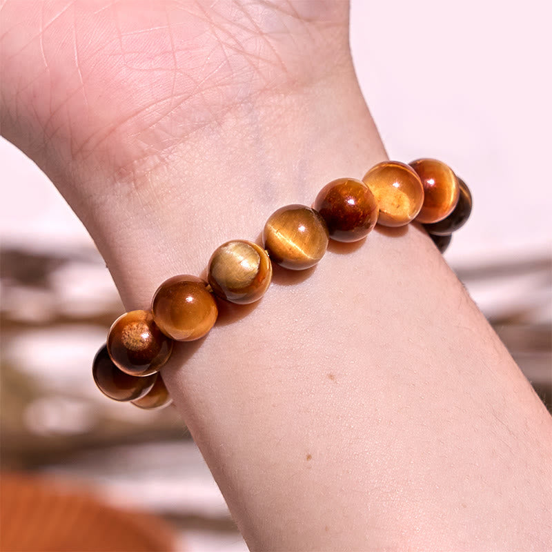 Bracelet de force en œil de tigre orange de 8 mm pour la concentration et la protection
