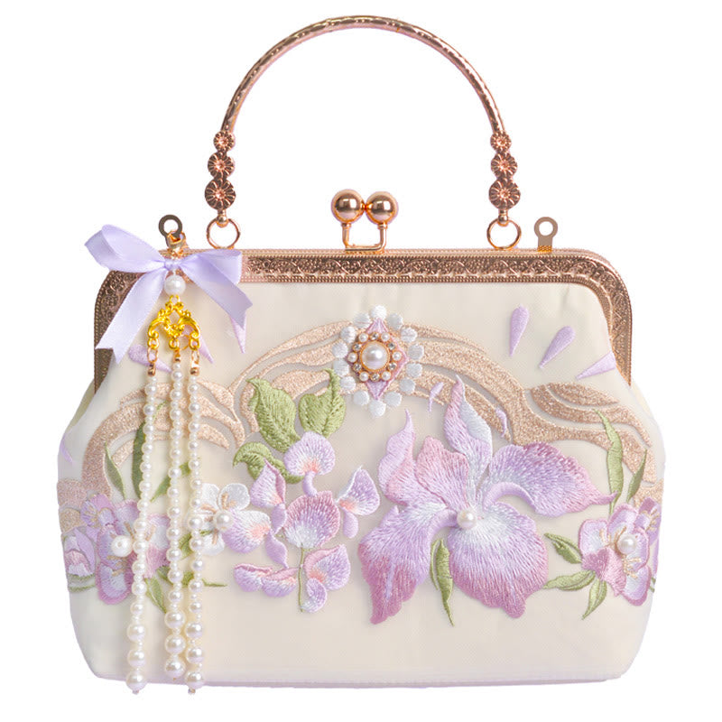 Sac à pompons brodé de fleurs violet clair pour l'énergie spirituelle