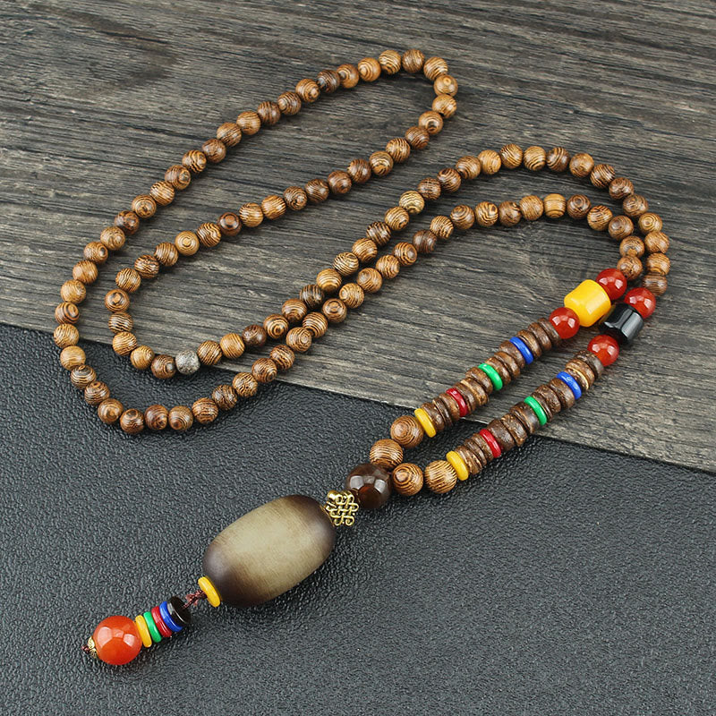 Collier d'équilibre en bois de wengé et agate pour la paix et la protection