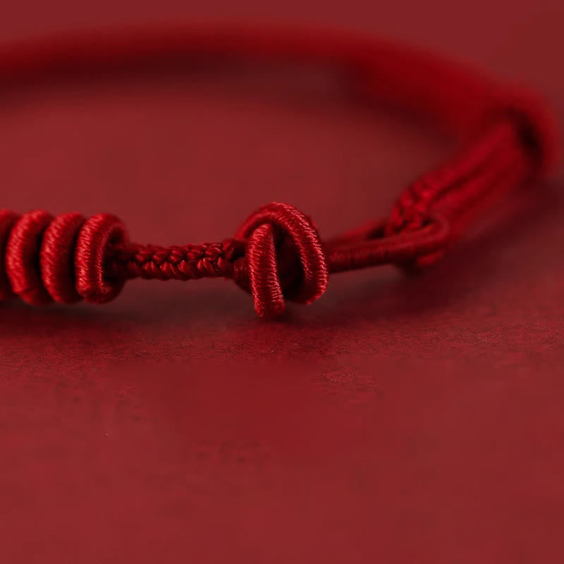 Bracelet de force à huit brins en corde rouge