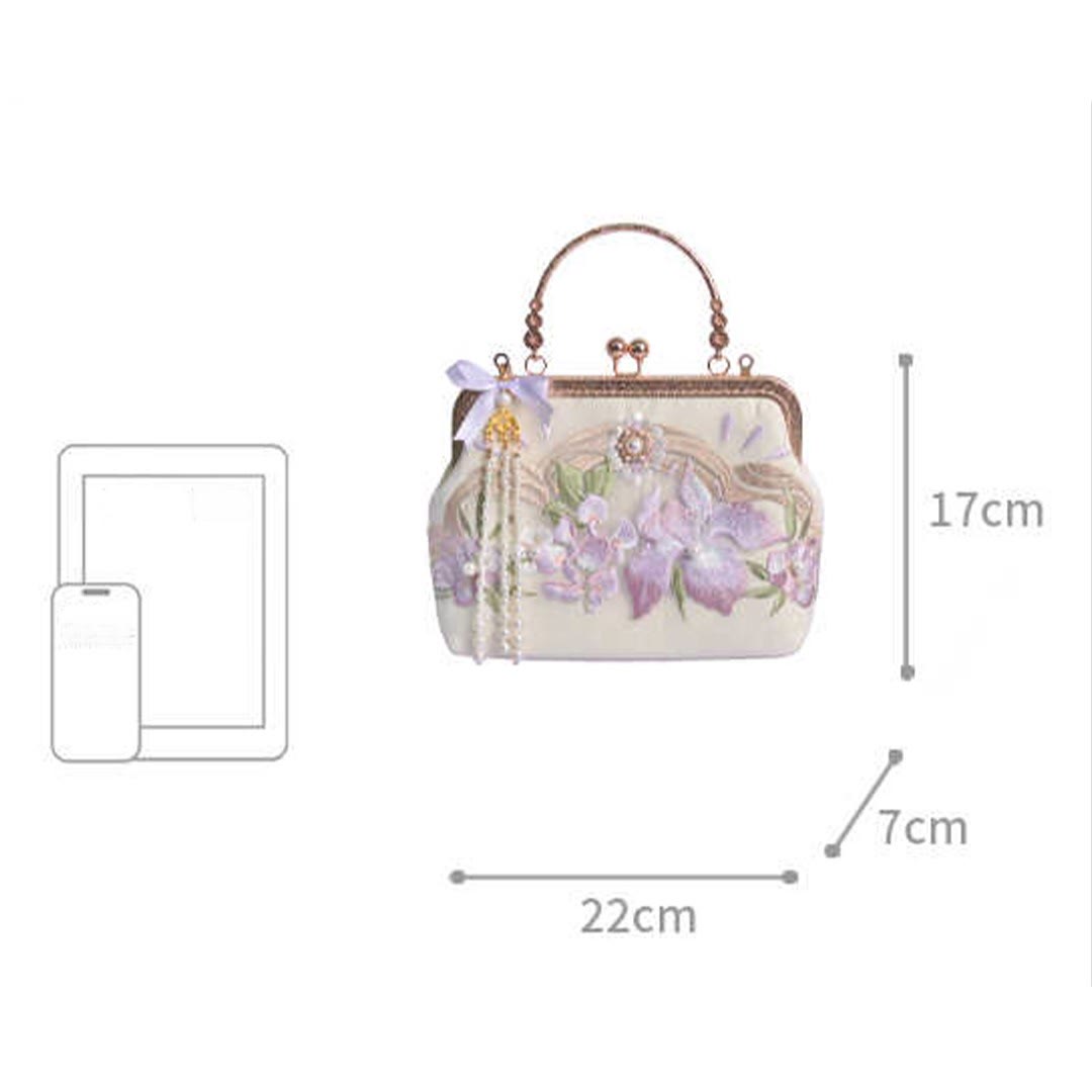 Sac à pompons brodé de fleurs violet clair pour l'énergie spirituelle