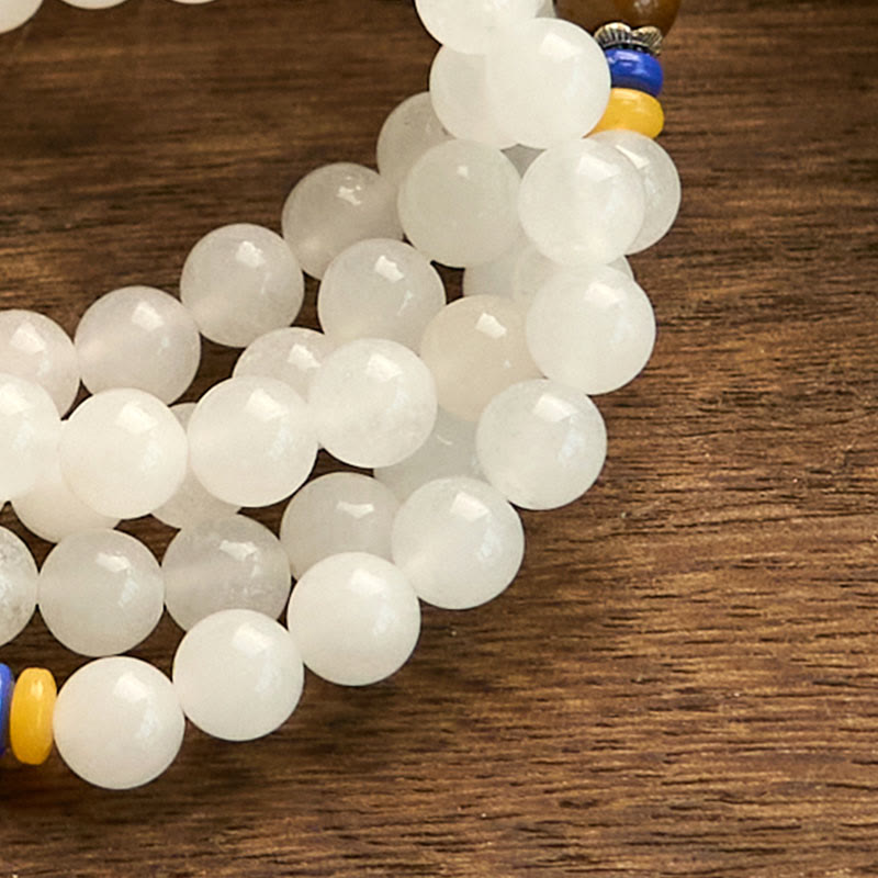 Bracelet Mala en jade et soie dorée à 108 perles pour la richesse et la chance