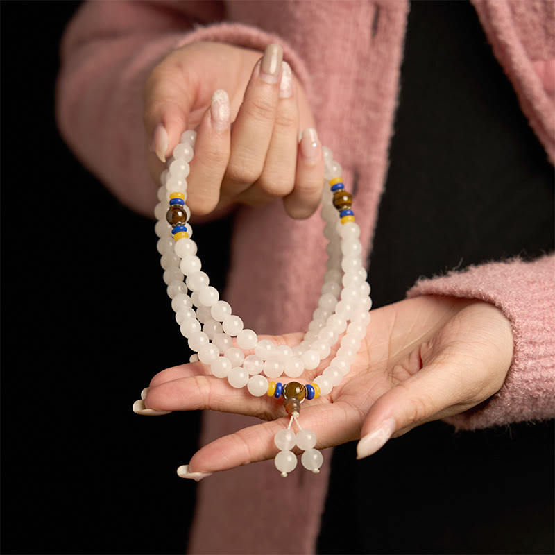 Bracelet Mala en jade et soie dorée à 108 perles pour la richesse et la chance