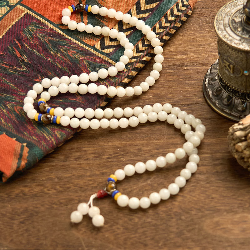 Bracelet Mala en jade et soie dorée à 108 perles pour la richesse et la chance
