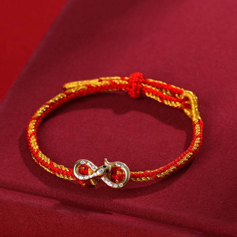 Bracelet tressé porte-bonheur en fil rouge Année du Serpent