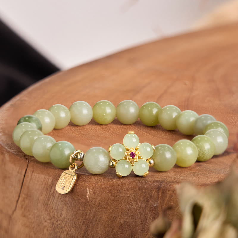 Bracelet porte-bonheur en jade vert avec fleur de 14 à 16 cm