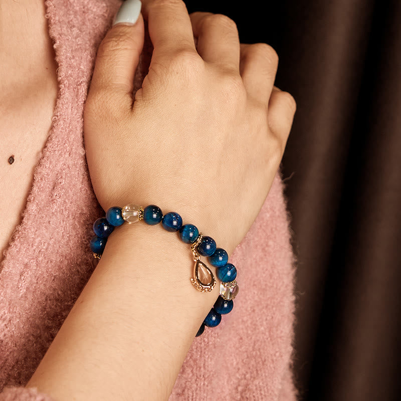 Bracelet œil de tigre bleu cristal blanc 8 mm