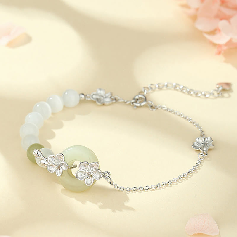 Bracelet porte-bonheur en jade Hetian et fleur de pêcher