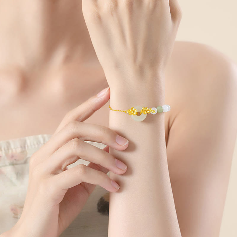 Bracelet porte-bonheur en jade Hetian et fleur de pêcher
