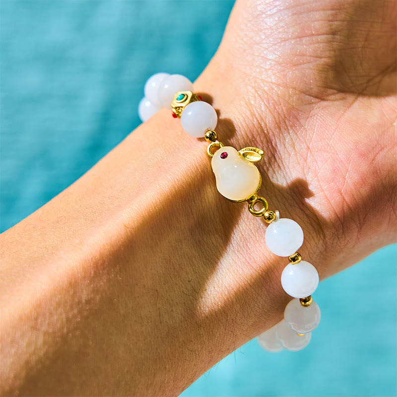 Bracelet de chance et de protection en jade de soie dorée de 8 mm