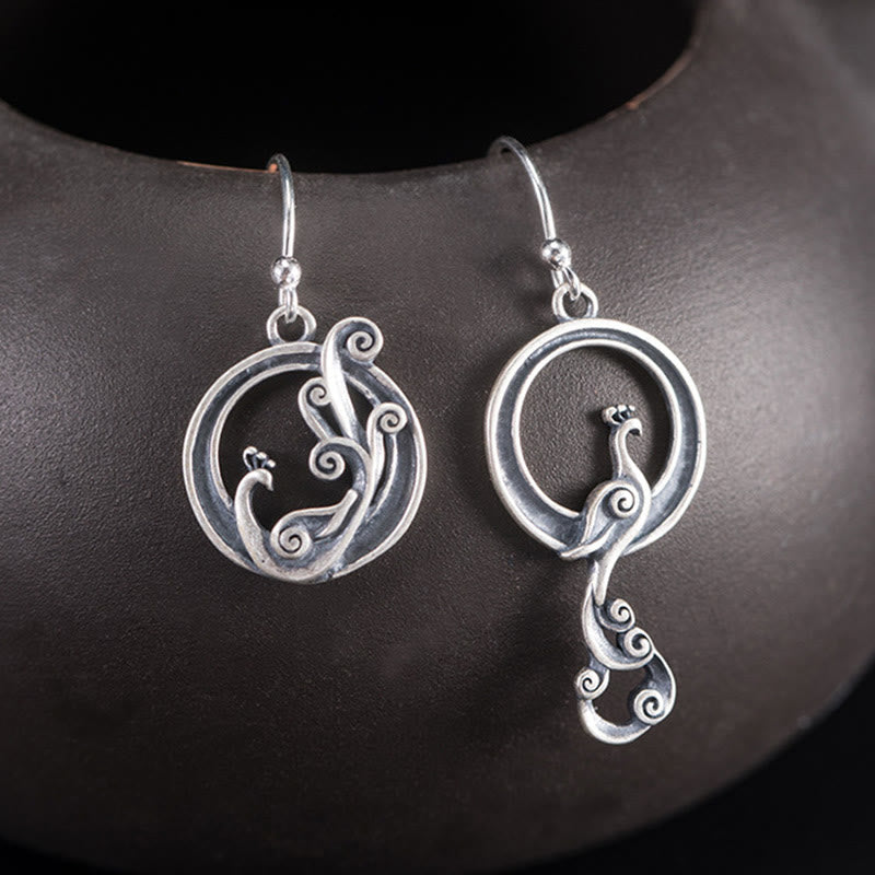 Boucles d'oreilles spirituelles en argent sterling avec motif paon