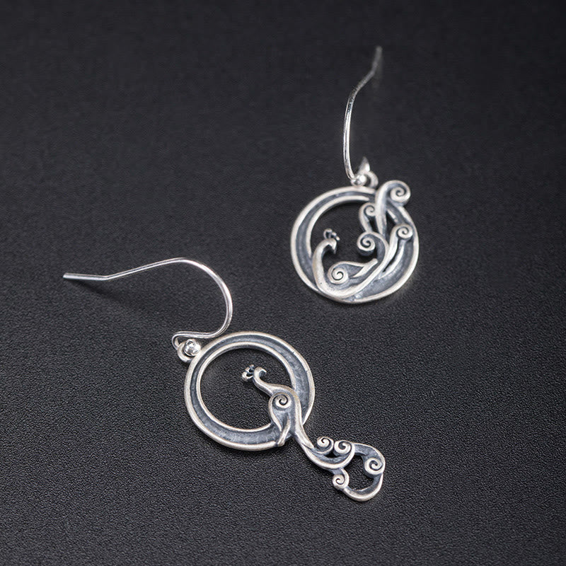 Boucles d'oreilles spirituelles en argent sterling avec motif paon