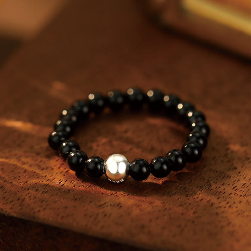Bague élastique en perles de cristal d'onyx noir et jade blanc