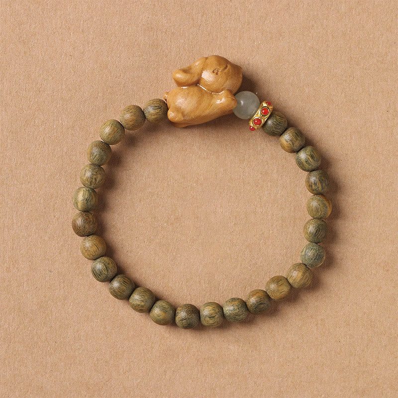 Bracelet lapin positif en bois de santal vert 6 mm
