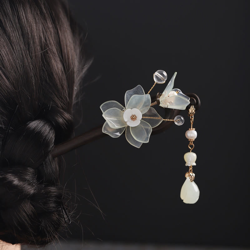 Épingle à cheveux chinoise en jade et ébène avec pompon en magnolia