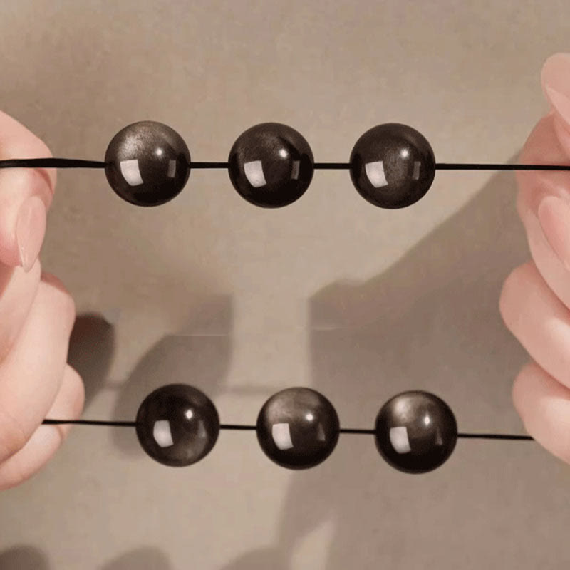 Bracelet Om Mani Padme Hum en obsidienne argentée brillante de 8 mm