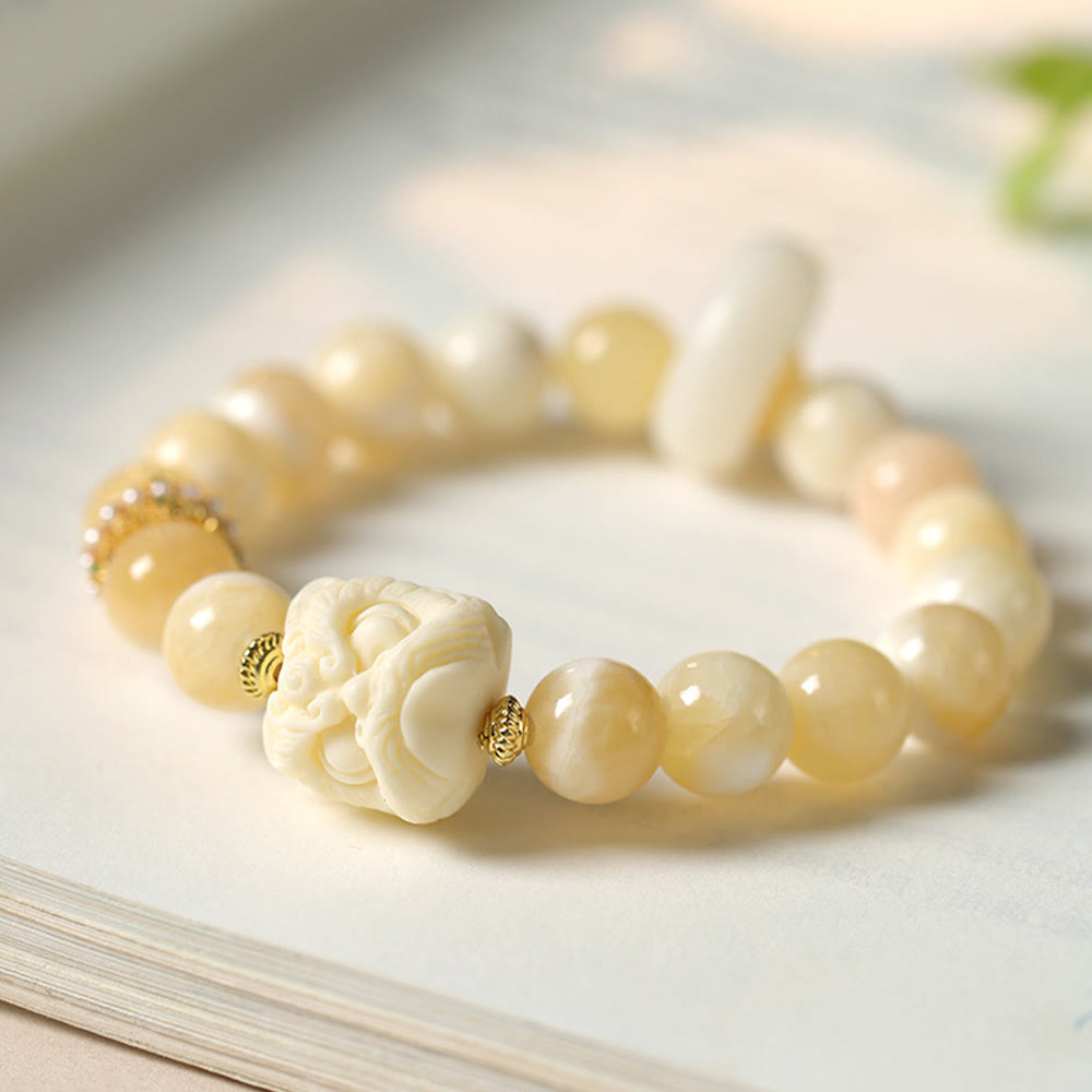 Bracelet en agate grise et ambre fruit ivoire pour la confiance