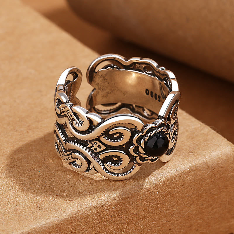 Bague porte-bonheur réglable en onyx noir avec bande en cuivre