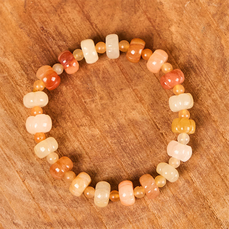 Bracelet en jade doré et soie 6x8 mm pour la richesse et la chance