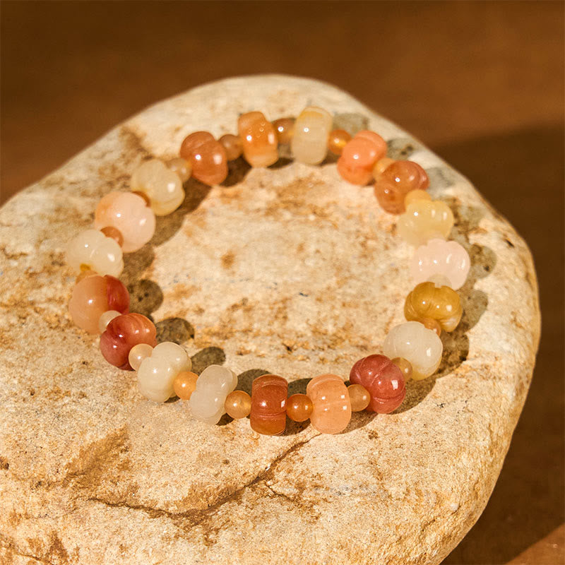 Bracelet en jade doré et soie 6x8 mm pour la richesse et la chance