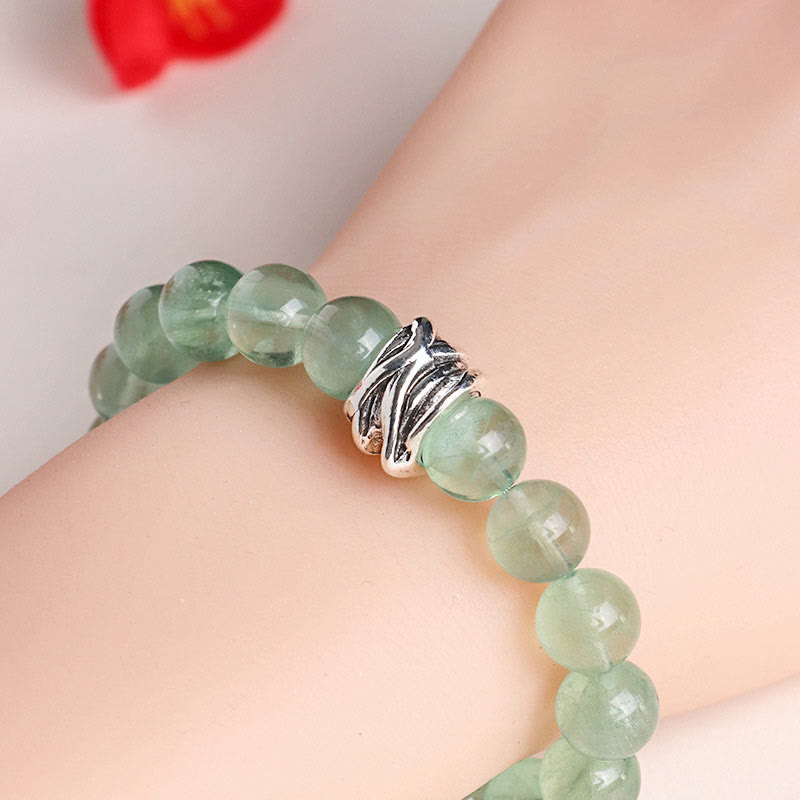 Bracelet en fluorite verte de 10 mm avec breloques lune et étoile
