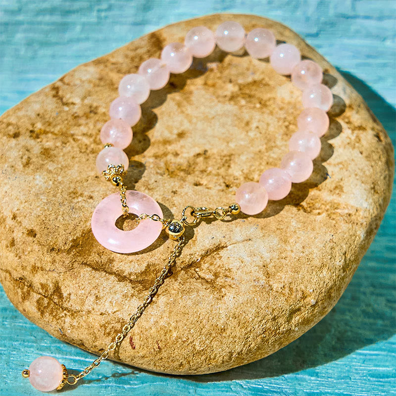 Bracelet en cristal rose de 8 mm avec boucle de paix