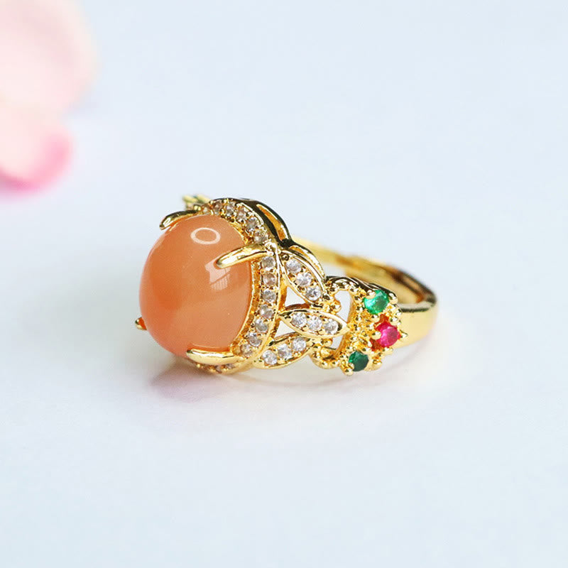 Bague ajustable en pierre de lune pêche, motif floral à quatre feuilles | Vintage