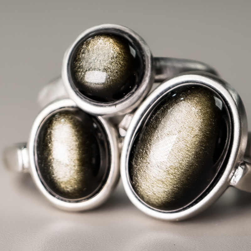 Bague ajustable en obsidienne dorée brillante 16 x 12 mm pour la protection de la richesse