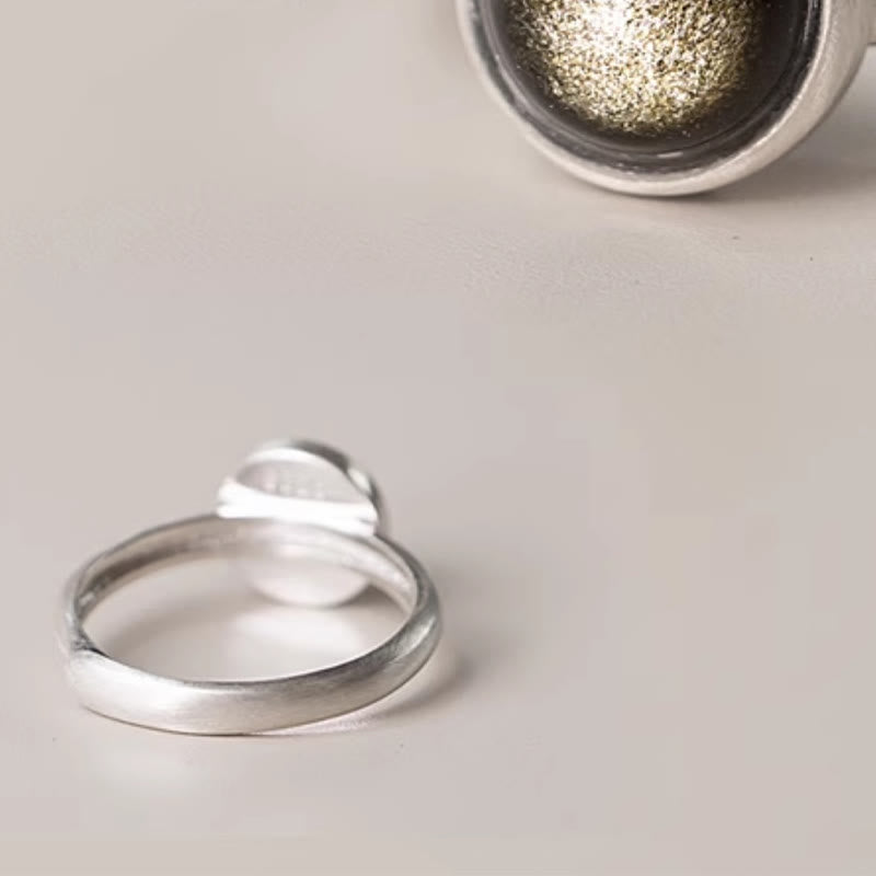 Bague ajustable en obsidienne dorée brillante 16 x 12 mm pour la protection de la richesse