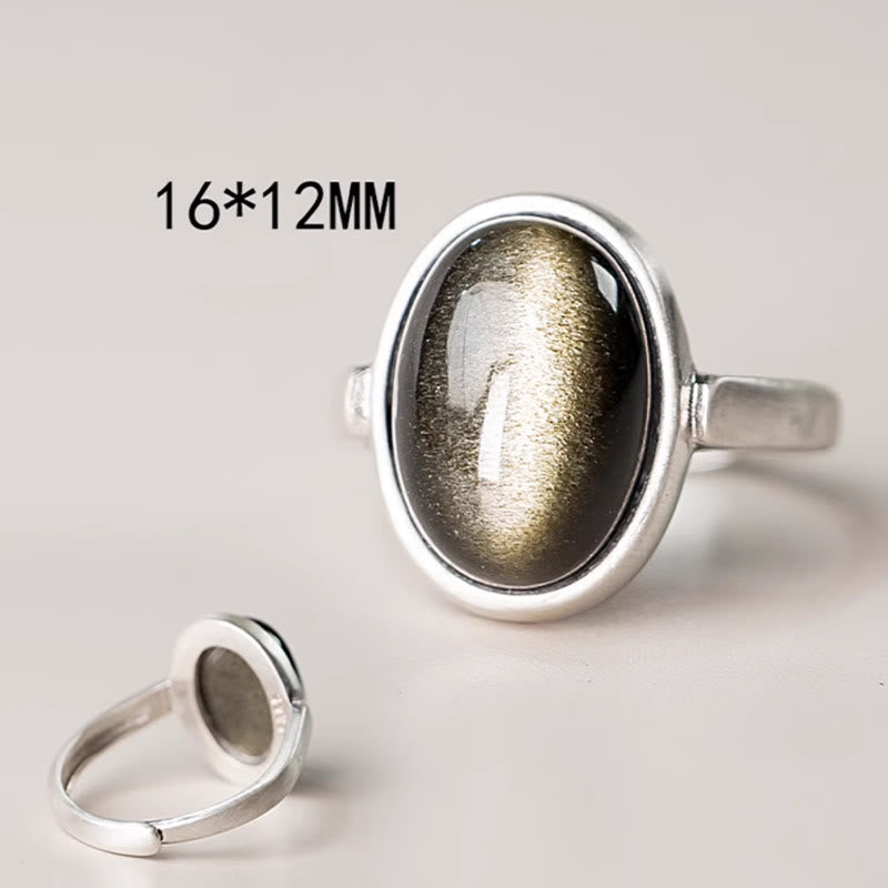 Bague ajustable en obsidienne dorée brillante 16 x 12 mm pour la protection de la richesse