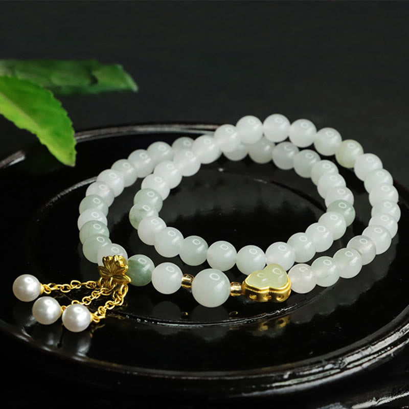 Bracelet de prospérité en jade Tianshan Lotus de 6 mm pour femme