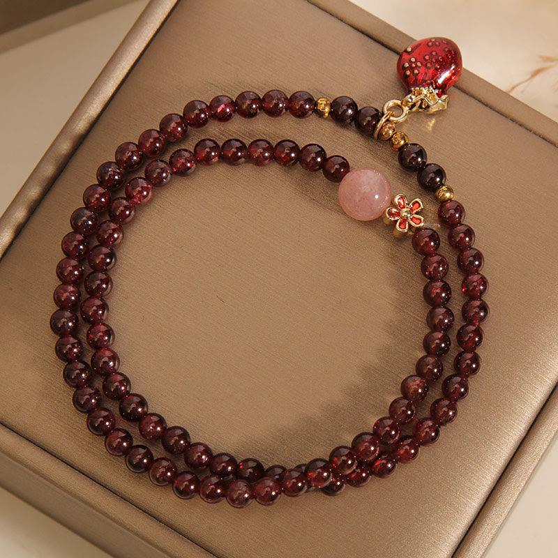 Bracelet de protection en quartz rose grenat de 3 mm avec bourse ou cloche