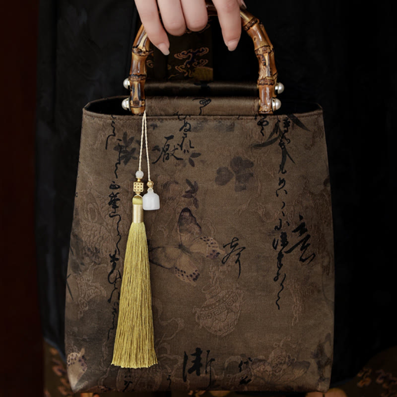 Sac à main en bambou avec motif papillon et poisson koï et poignées en jade