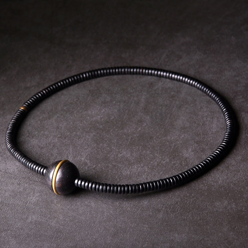 Bracelet boule en laiton et bois d'ébène de 18 mm pour l'équilibre et le calme
