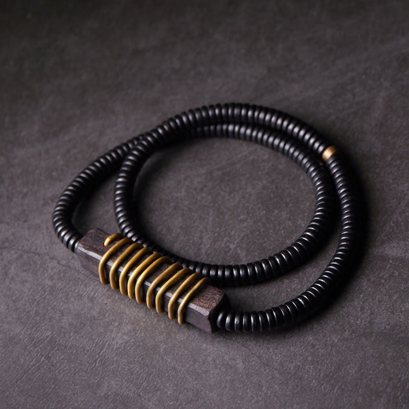 Bracelet boule en laiton et bois d'ébène de 18 mm pour l'équilibre et le calme