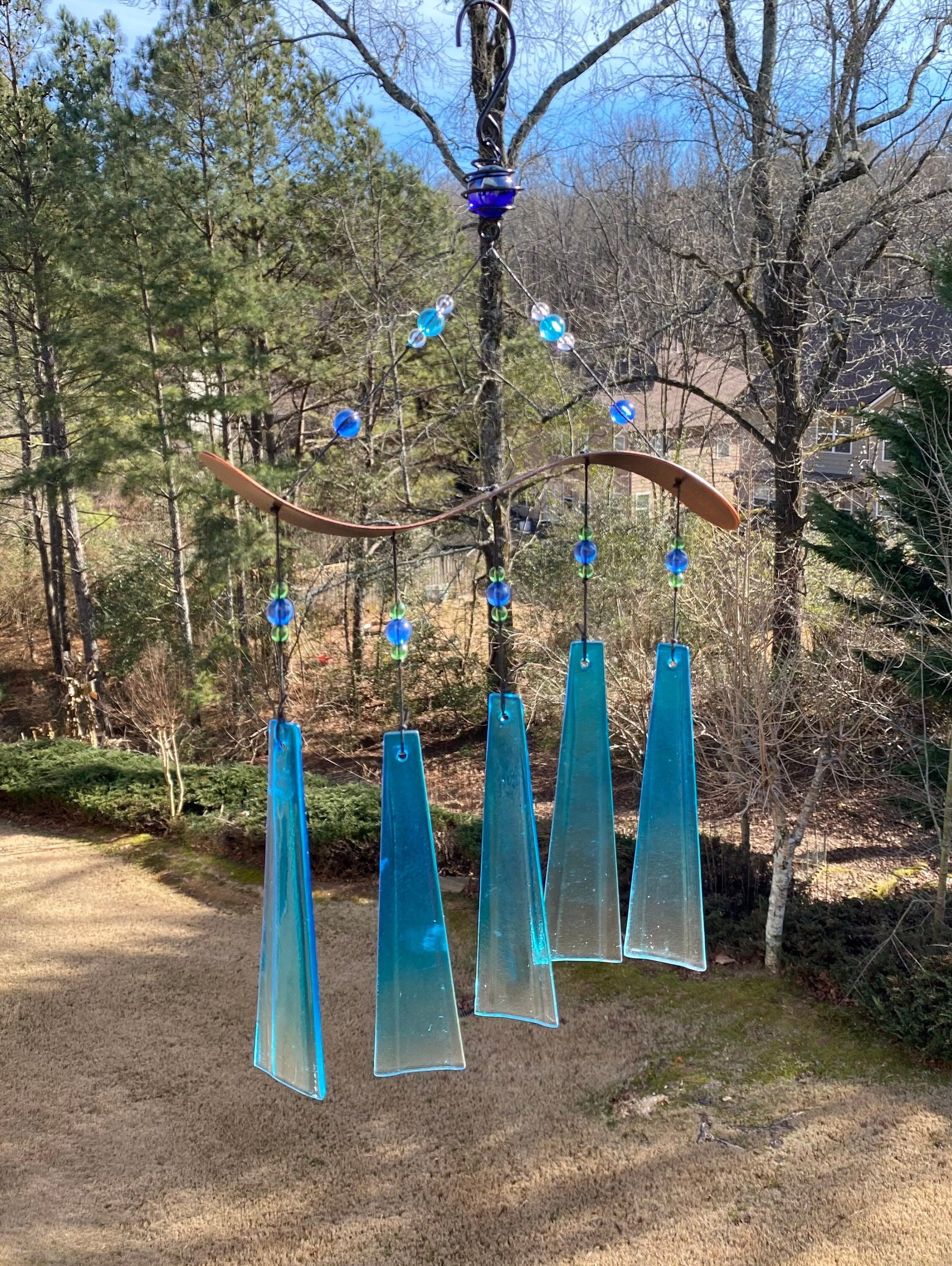 Blue glass wind chime with crystal beads on curved branches for garden decor
