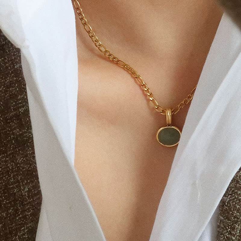 Collier pendentif ovale turquoise en acier titane