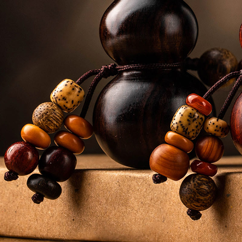 Porte-clés en ébène et gourde de santal rouge pour la chance et la protection