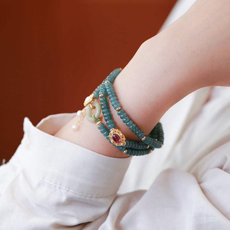 Bracelet triple tour en jade cyan avec boucle de paix en argent