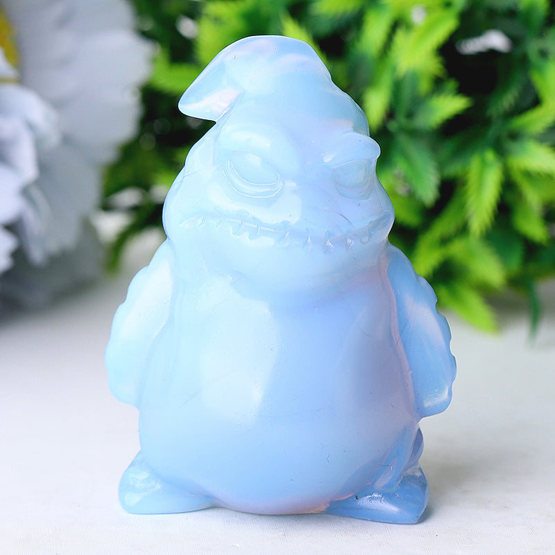 Figurine sculptée en cristal d'opalite bleue de 2,6 pouces